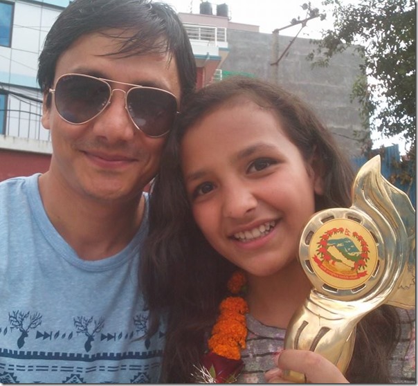 gajit bista with daughter after winnign national award